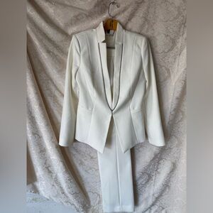 NWT White House Black Market Pantsuit in Ecru with silver beading on the label